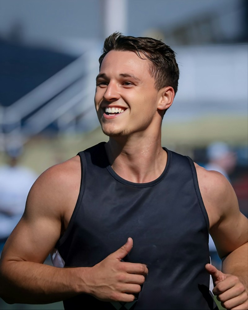 Runner outdoors in sports clothing; illustrative stock photograph